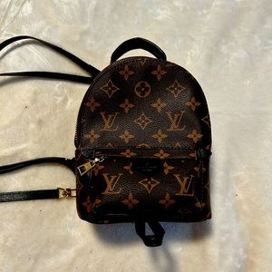 LV palm spring mini backpack